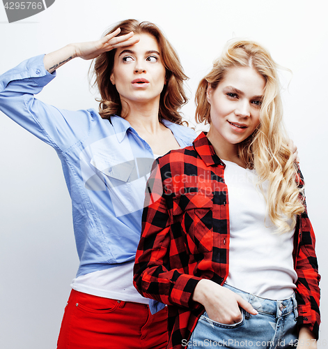 Image of best friends teenage girls together having fun, posing emotional on white background, besties happy smiling, lifestyle people concept close up