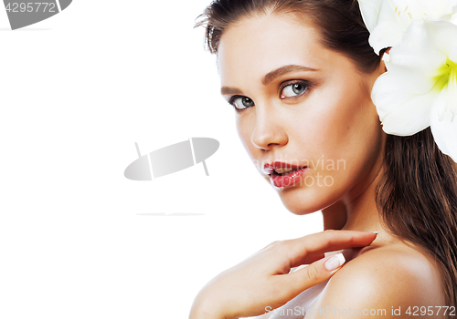 Image of young pretty woman with  Amarilis flower close up isolated on wh