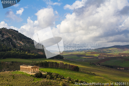 Image of Landscape of Sicily and ancient greek temple in Segesta archaeological area, Italy.