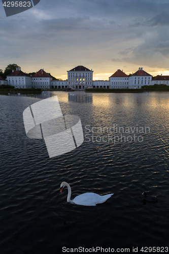 Image of Dramatic scenery of post storm sunset of Nymphenburg palace in Munich Germany.