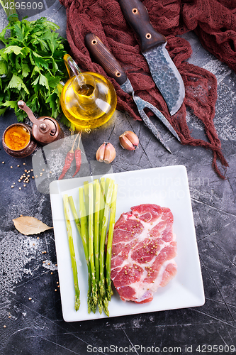 Image of meat with asparagus