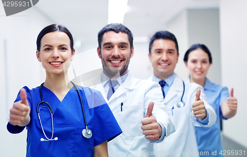 Image of medics or doctors at hospital showing thumbs up