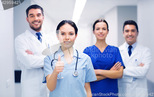 Image of medics or doctors at hospital showing thumbs up