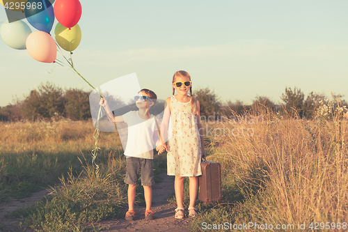 Image of Happy children playing on the road at the day time.