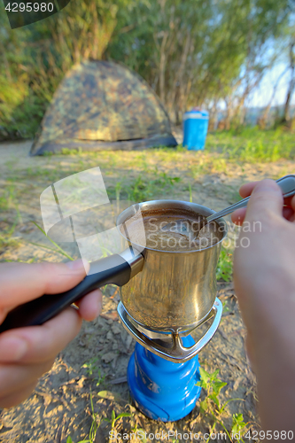 Image of Making coffee on campfire