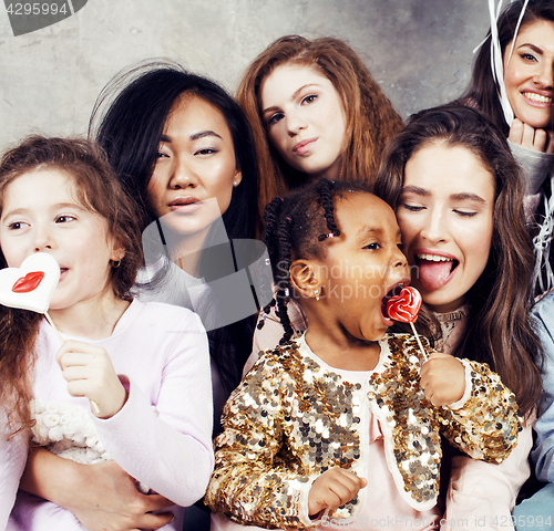 Image of Lifestyle and people concept: young pretty diversity nations woman with different age children celebrating on birth day party together happy smiling, making selfie. African-american, asian and caucasi