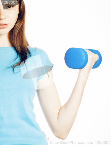 Image of young pretty brunette woman with blue dumbbell isolated cheerful smiling, part of body, diet people concept on white background