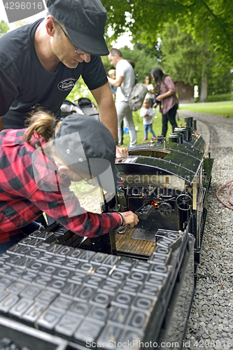 Image of Thun, Switzerland  -23 July, 2017: Bukhari steam train children 