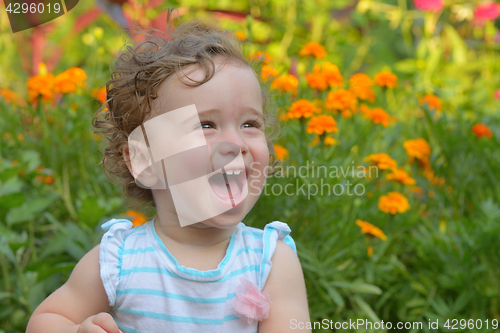 Image of baby girl laughing