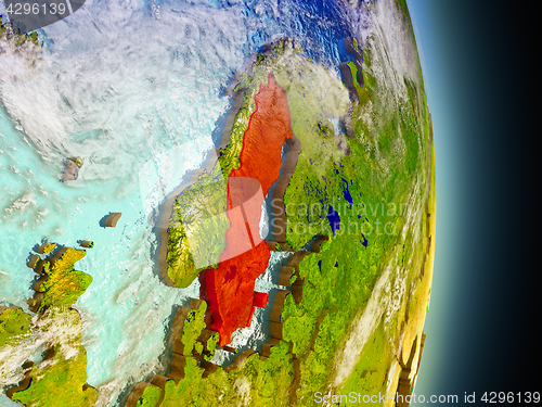 Image of Sweden in red from space
