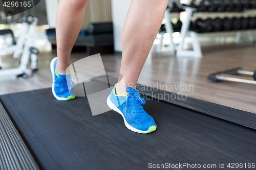 Image of Woman legs on treadmill