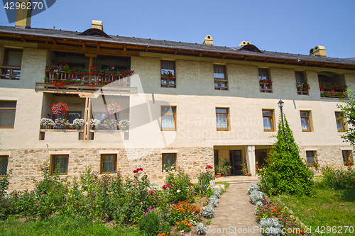 Image of Flower garden and traditional monastery