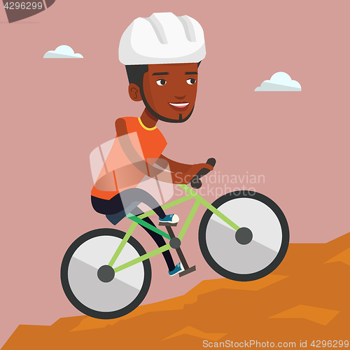 Image of Young man on bicycle traveling in the mountains.