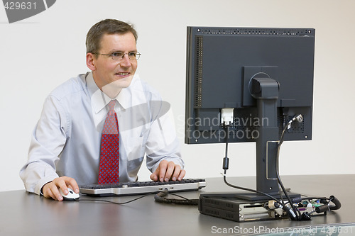 Image of Businessman working with computer