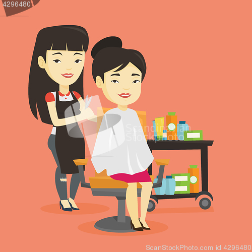 Image of Hairdresser making haircut to young woman.