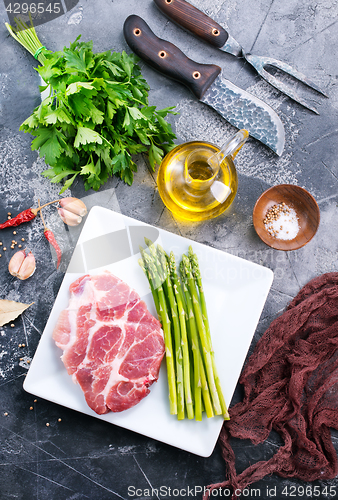 Image of meat with asparagus