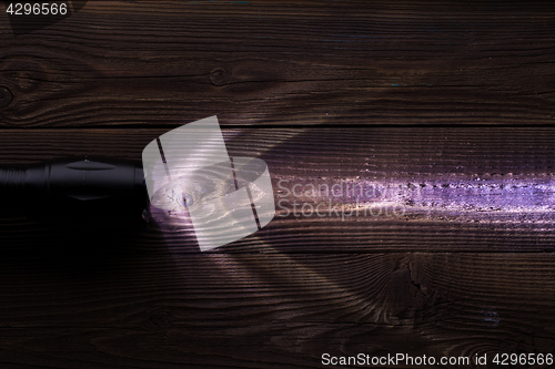 Image of Wooden texture with glowing lantern