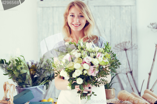 Image of Beautiful florist at flower shop