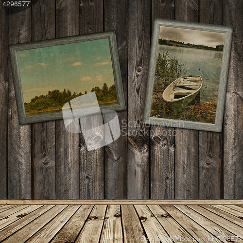 Image of wooden interior with old frames photos