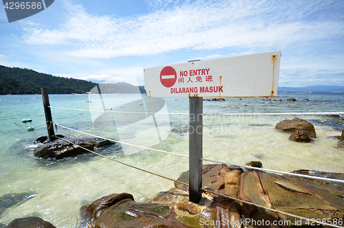 Image of No entry sign on beach