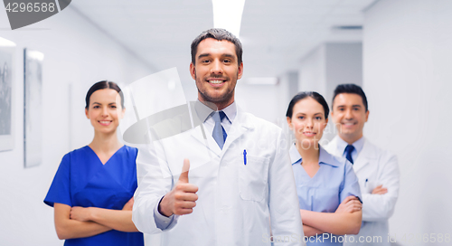 Image of medics or doctors at hospital showing thumbs up