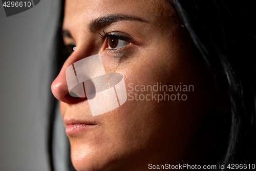 Image of close up of unhappy crying woman