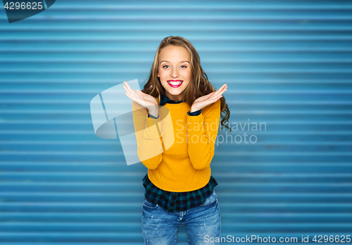 Image of happy young woman or teen girl in casual clothes