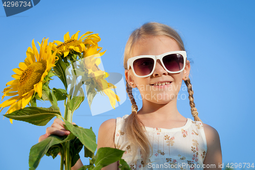 Image of Portrait of one  beautiful  little girl.