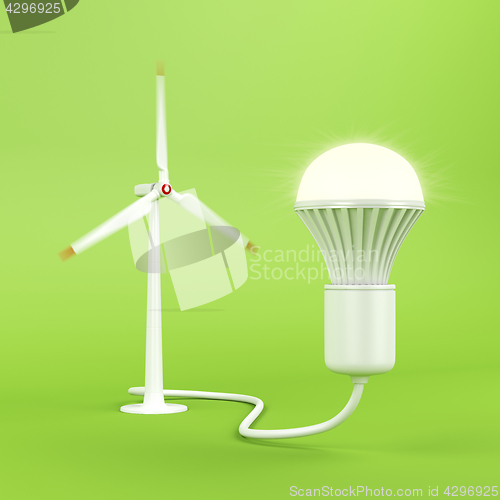 Image of Wind turbine and glowing light bulb