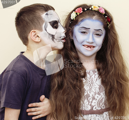 Image of zombie apocalypse kids concept. Birthday party celebration facepaint on children dead bride, scar face, skeleton together, halloween holiday