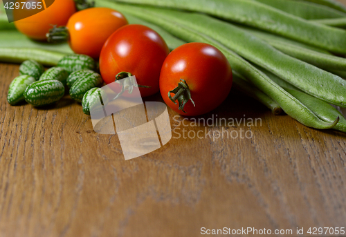 Image of Cucamelons, orange and red tomatoes and runner beans