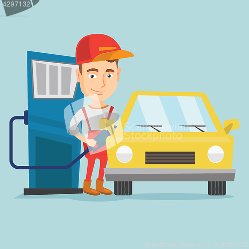 Image of Worker filling up fuel into car at the gas station