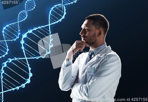 Image of doctor or scientist in white coat with dna