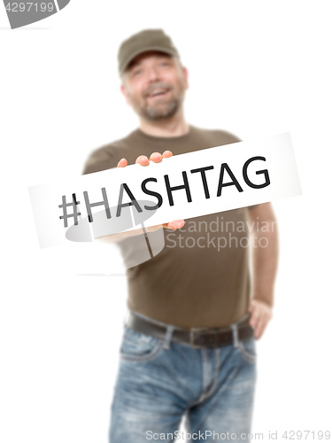 Image of bearded man white board hashtag