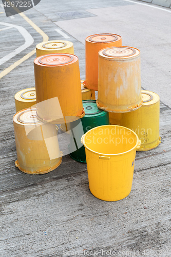 Image of Yellow Buckets at Street