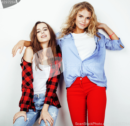 Image of best friends teenage girls together having fun, posing emotional on white background, besties happy smiling, lifestyle people concept close up. making selfie