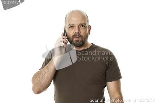 Image of a bearded man at the phone