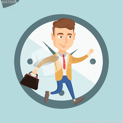 Image of Business man running on clock background.