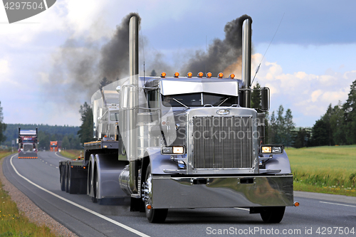 Image of Peterbilt 359 S Trucking and Blowing Smoke