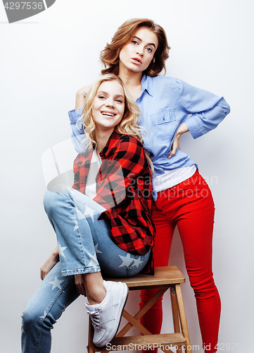 Image of best friends teenage girls together having fun, posing emotional on white background, besties happy smiling, lifestyle people concept close up. making selfie