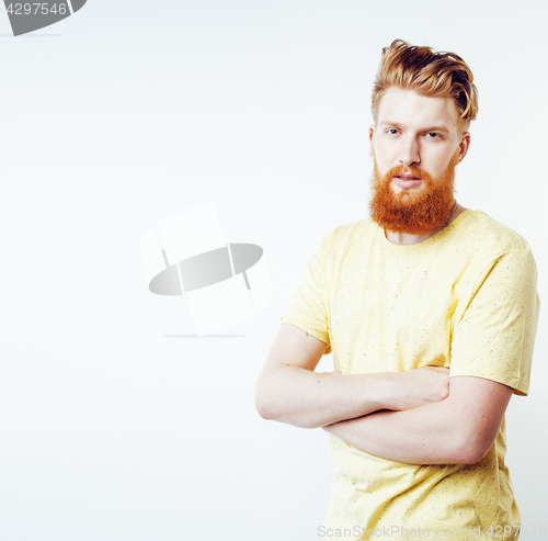 Image of young handsome hipster ginger bearded guy looking brutal isolate