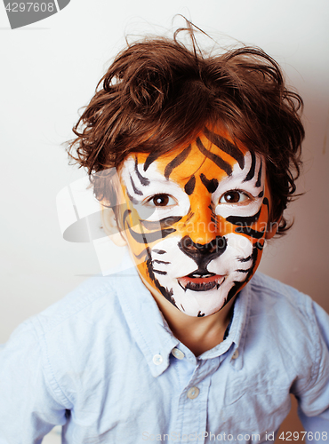 Image of little cute boy with faceart on birthday party close up, little 