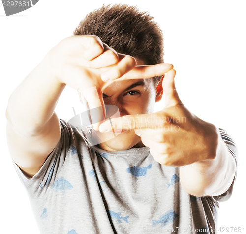 Image of young pretty man framing with fingers isolated on white