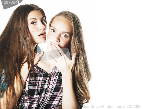 Image of two cute teenagers having fun together isolated on white