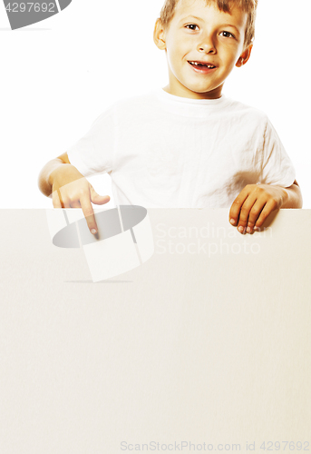 Image of little cute boy holding empty shit to copyspace isolated close u