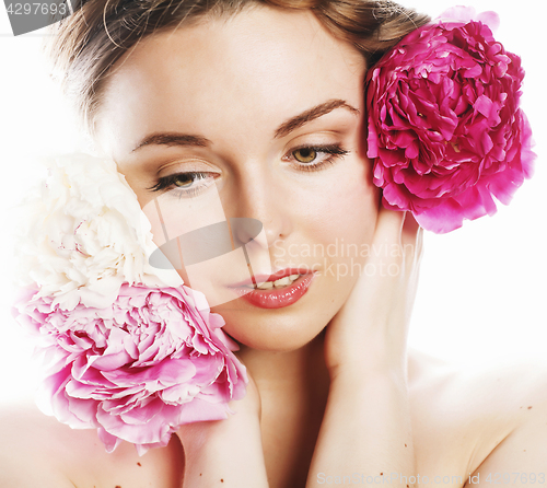 Image of young beauty woman with flower peony pink closeup makeup soft te