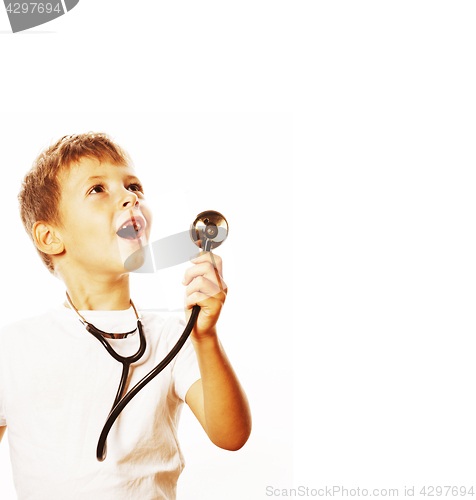 Image of little cute boy with stethoscope playing like adult profession d