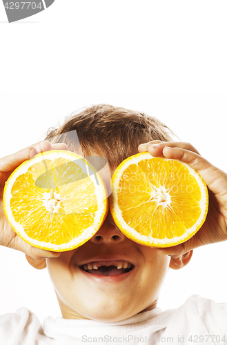 Image of little cute boy with orange fruit double isolated on white smili