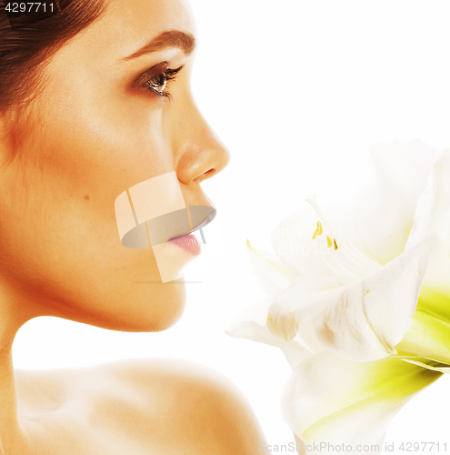 Image of young pretty woman with  Amarilis flower close up isolated on wh