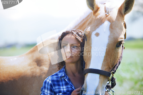 Image of Woman and horse together